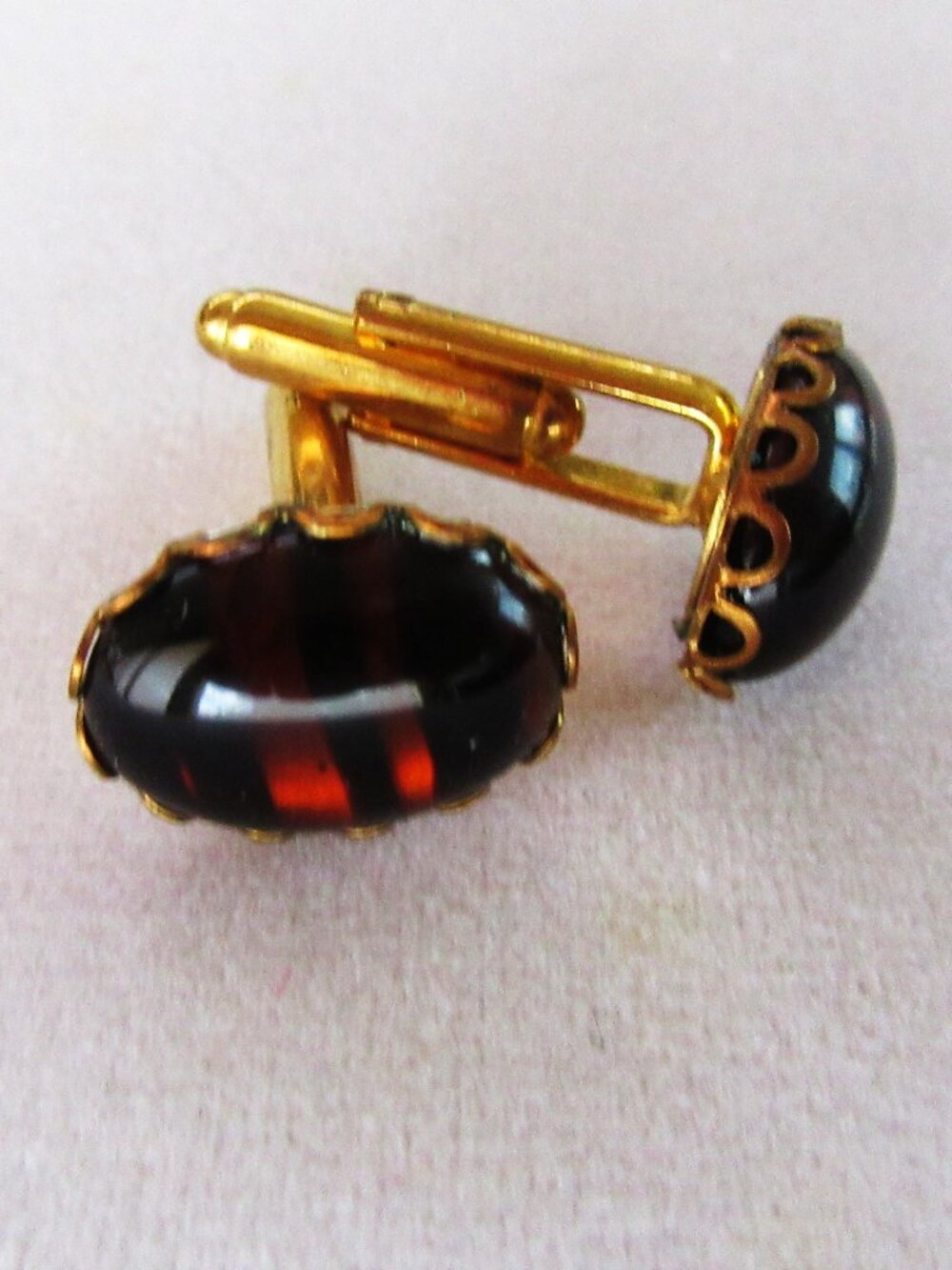 Cuff links with tiger eye stones in new brass settings